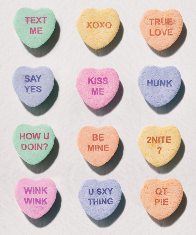 Traditional candy hearts with short sayings on them.